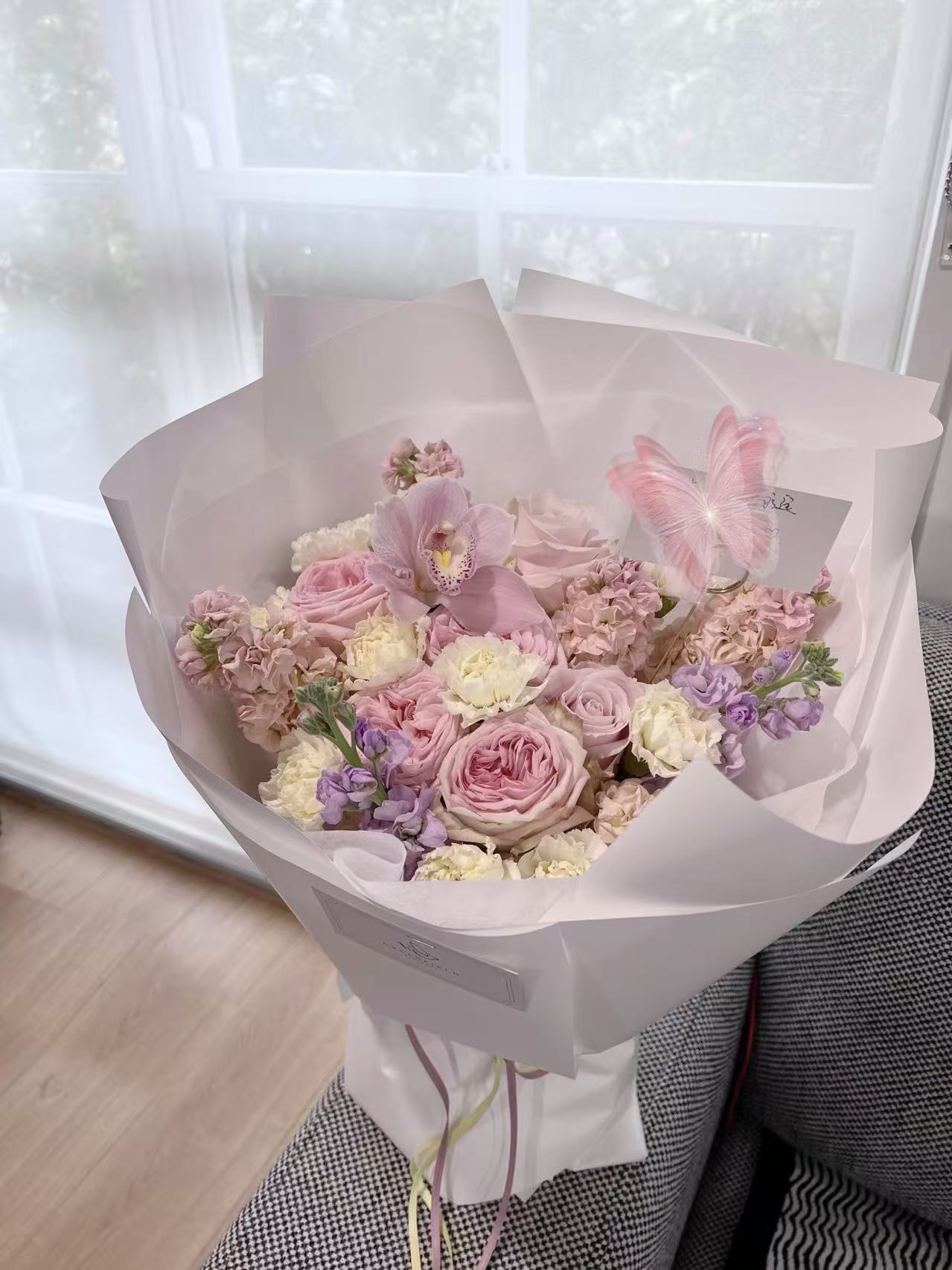 Apricot pink and purple flower bouquet