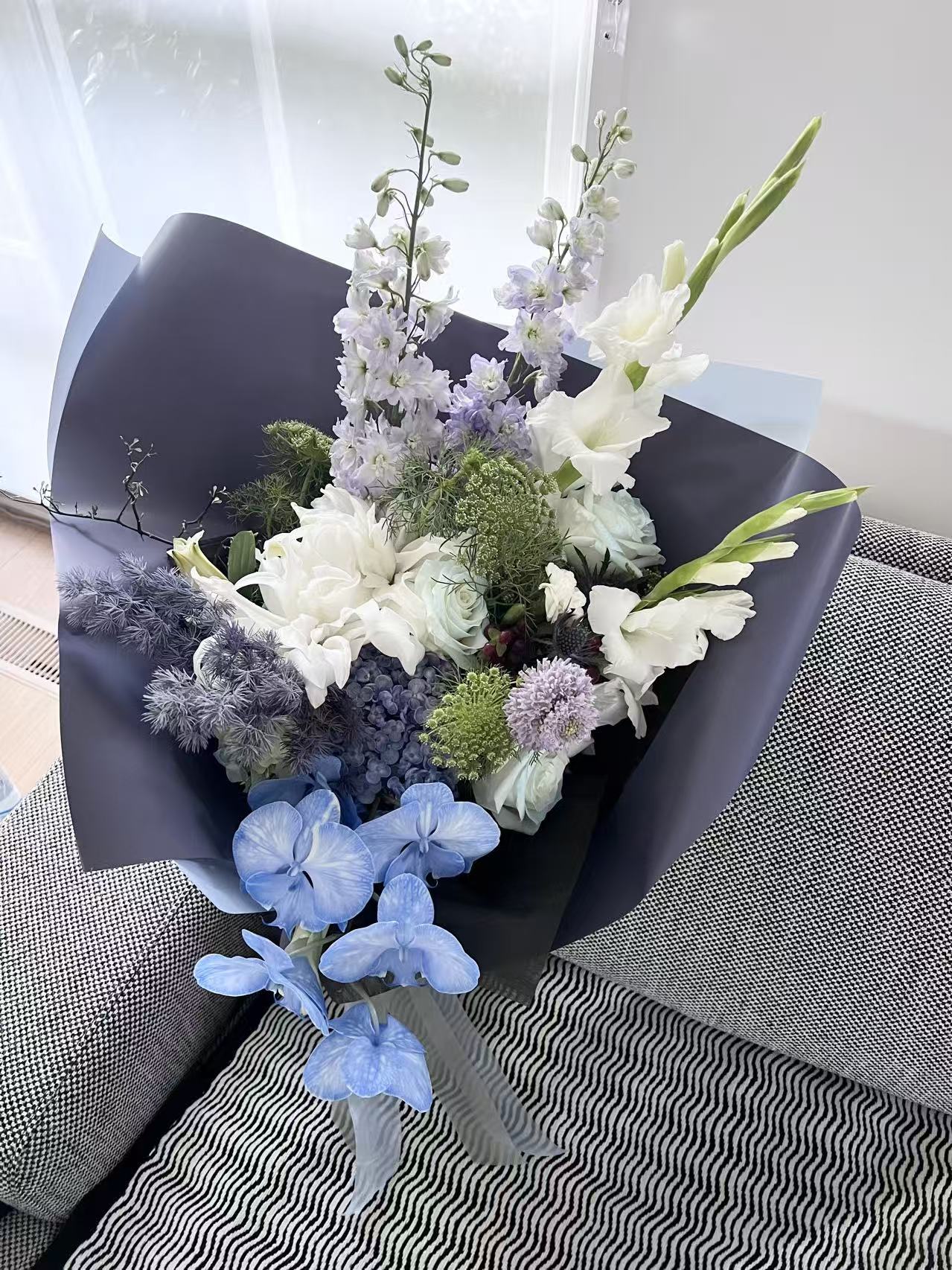 Gladiolus, delphinium and phalaenopsis orchid bouquet