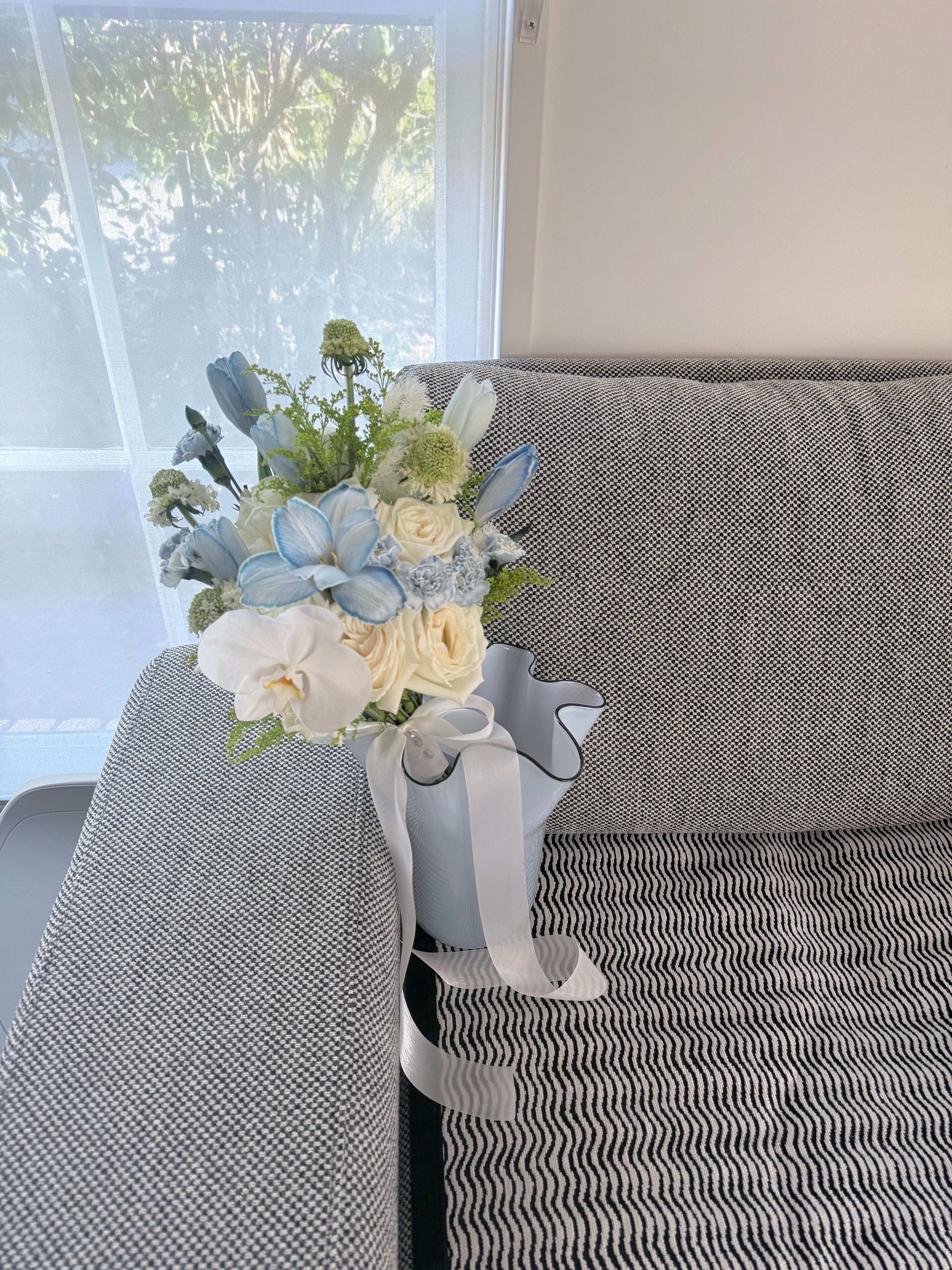 Pale blue and white flower bouquet