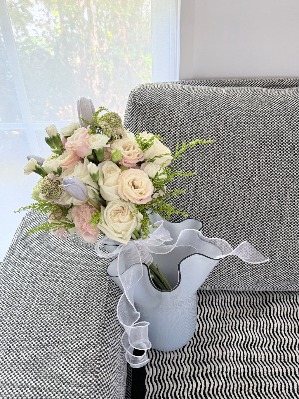 Soft pink, white and purple flower bouquet