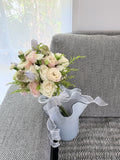 Soft pink, white and purple flower bouquet