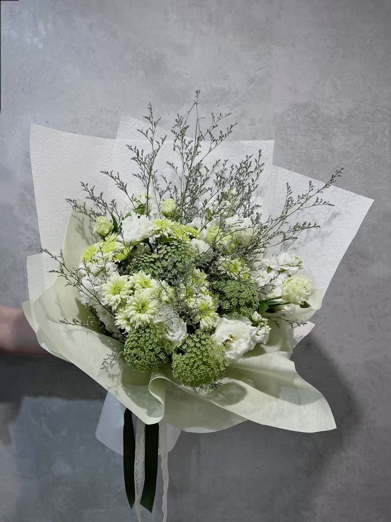 White and green bouquet with laceflower and lisianthus