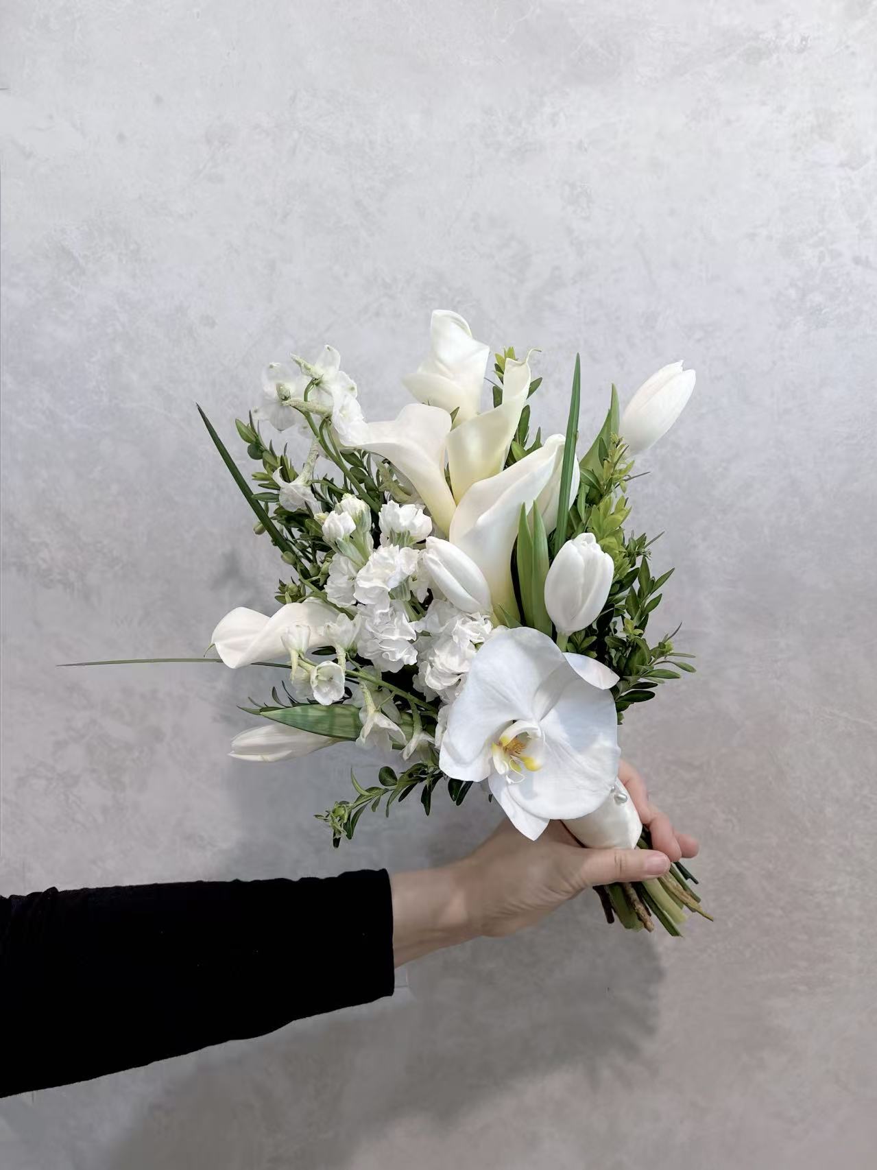 White and green bouquet with soft airy flowers