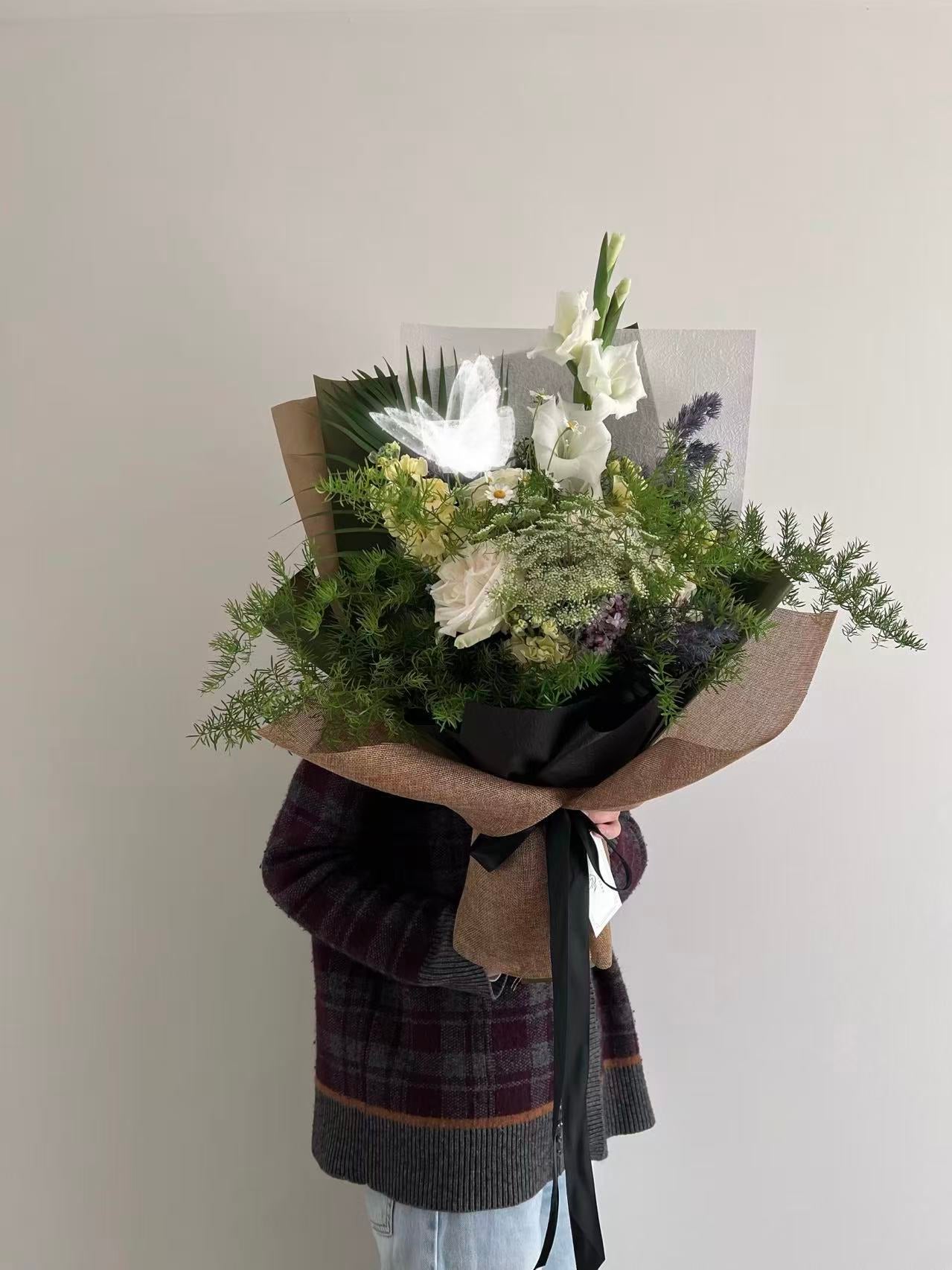 gladioli  bouquet with greenery and purple accents