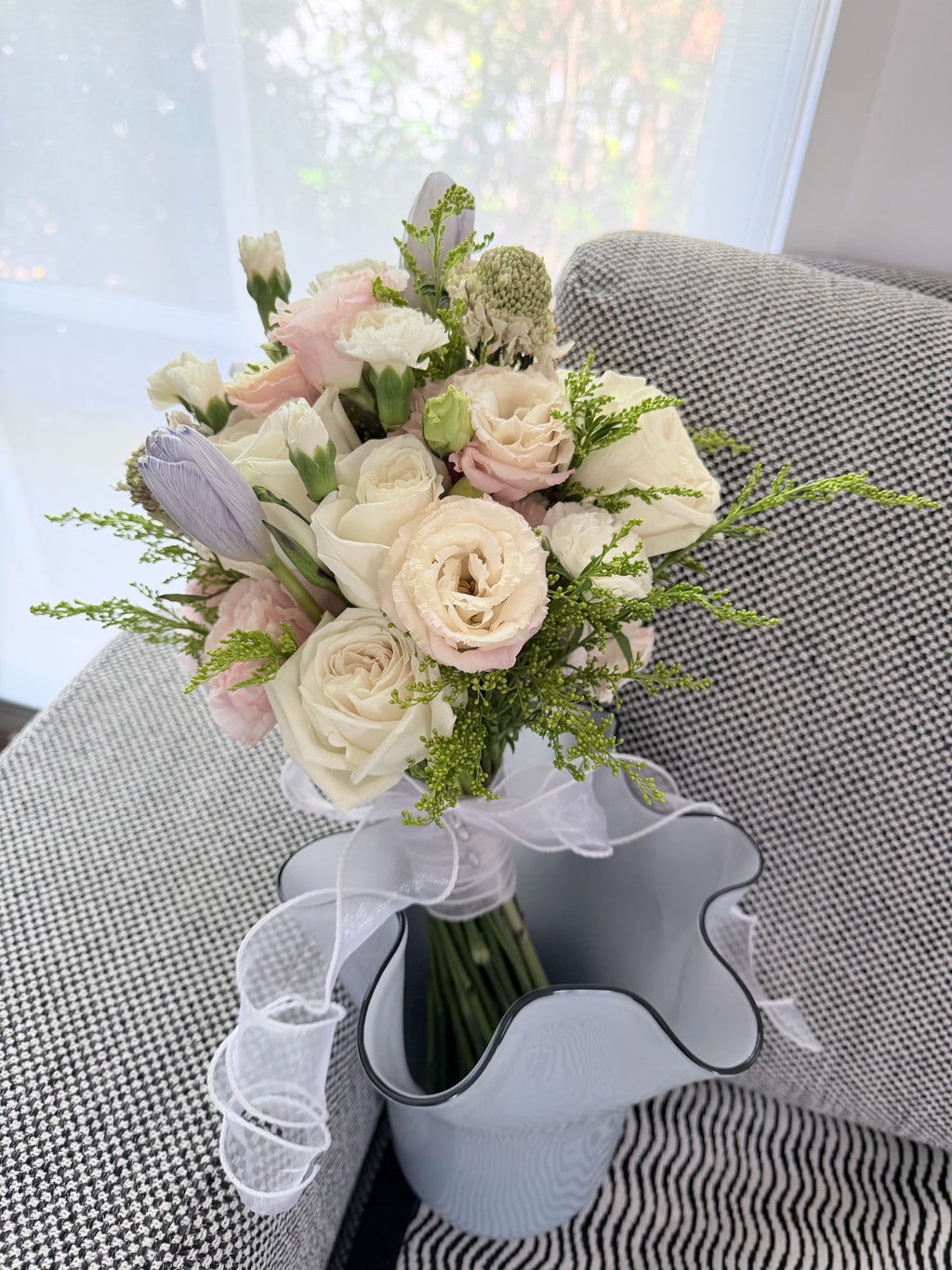 Soft pastel bouquet with pink, white and purple flowers